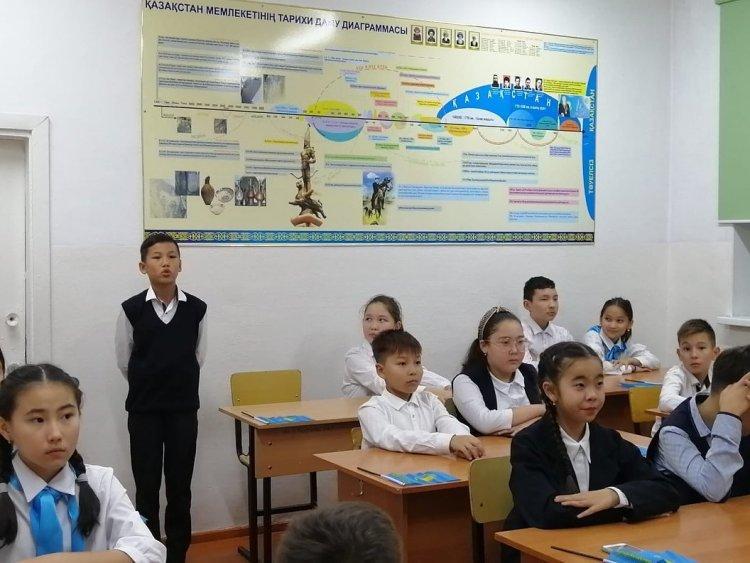 "Мұзда жанған алау" тақырыбында 6 "А" сыныбы оқушыларымен танымдық сағат өткізілді.